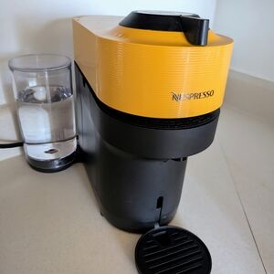 Nespresso Yellow and Black Coffee Machine